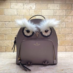 Leather Kate Spade backpack with owl design.